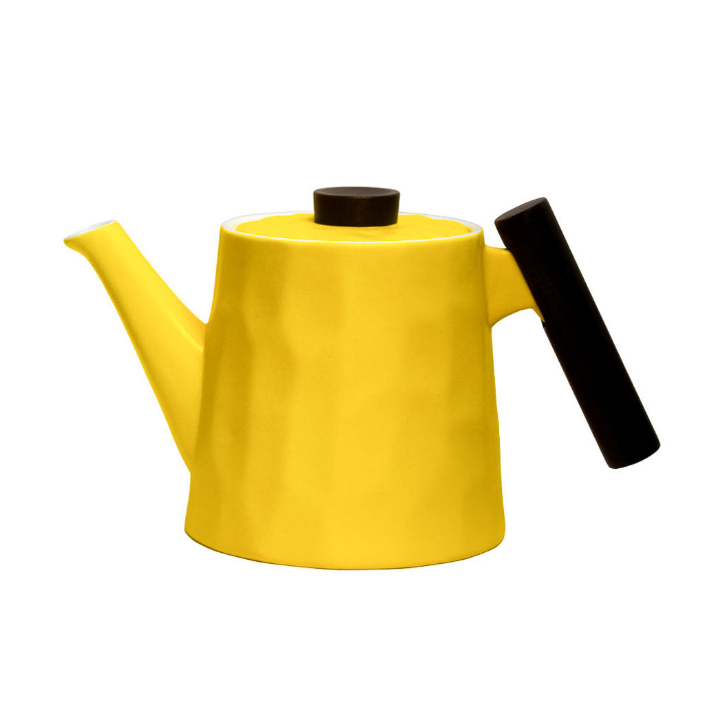 moderne Teekanne aus Porzellan mit Wabenstruktur - gelb