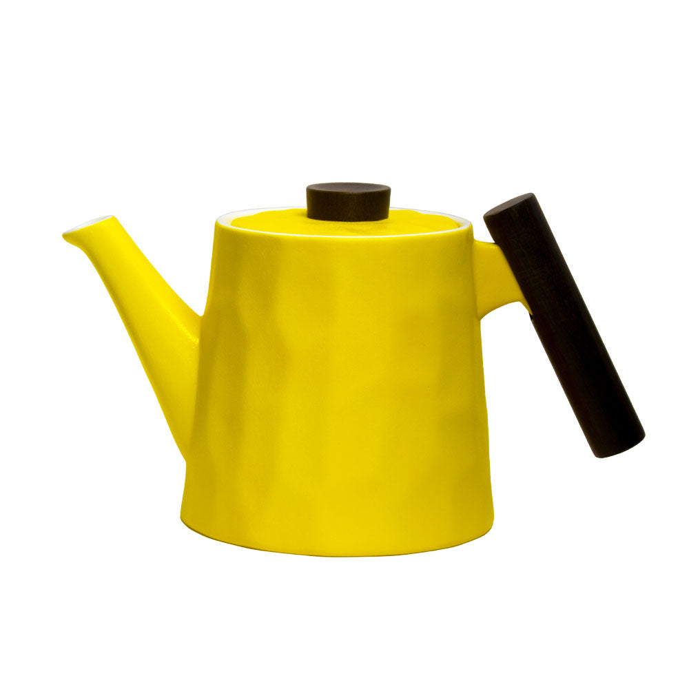 moderne Teekanne aus Porzellan mit Wabenstruktur - gelb